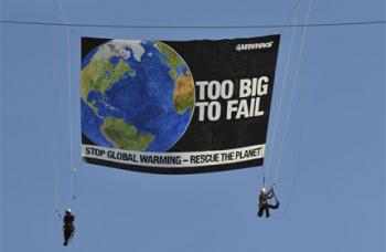 Greenpeace Banner: Earth, Too Big To Fail.